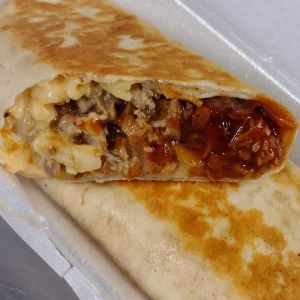 Photo of the EVO Burrito: Select your preferred pulled meat, sauce, creamy mac 'n cheese, and savory baked beans, all expertly wrapped in a large tortilla and perfectly grilled.
